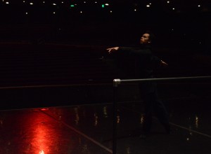 Kevin Gael Thomas preparing on stage for a performance